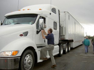 Huge, white truck and a driver 